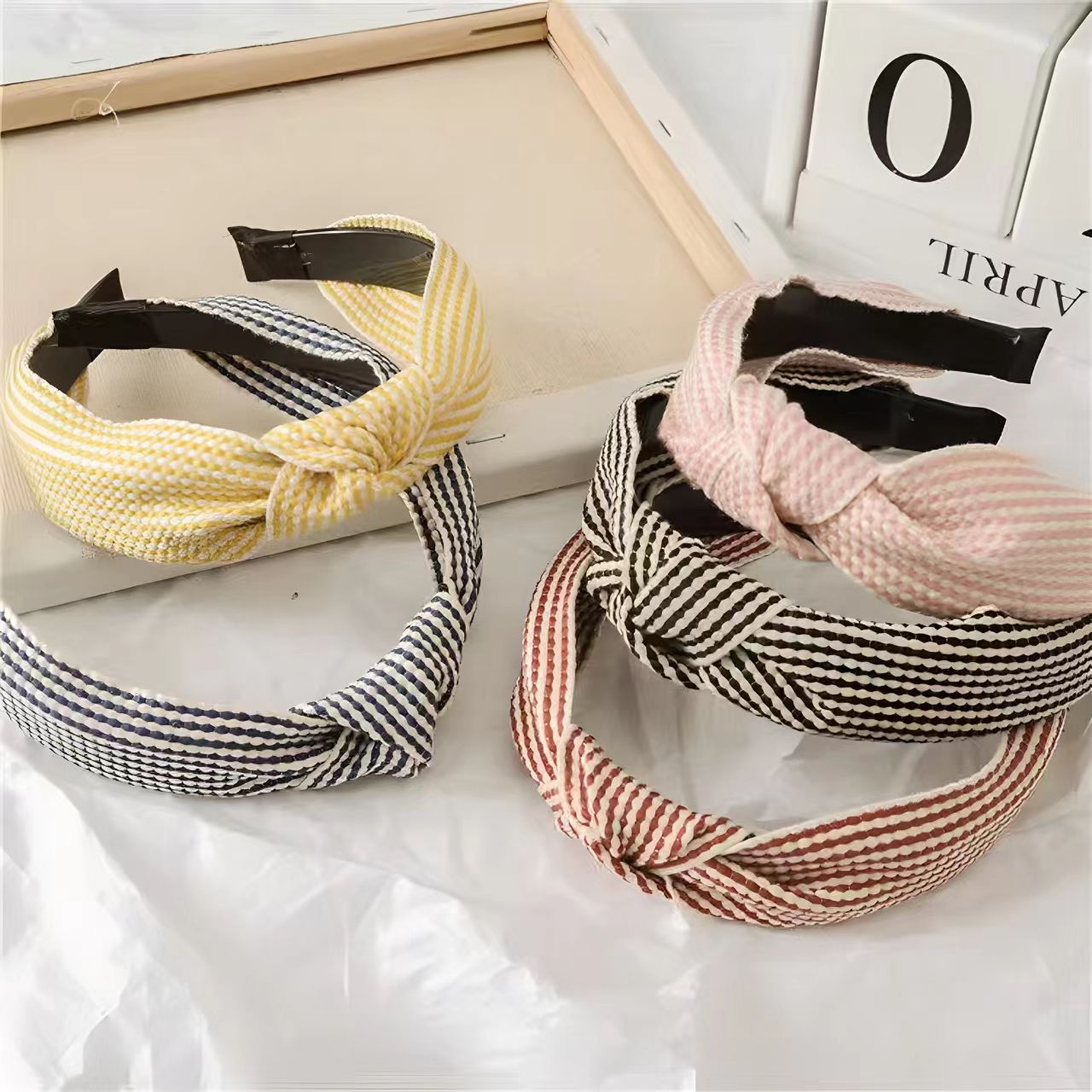 Geruite hoofdband met brede ra - Headband Summer Knit recensie en prijs